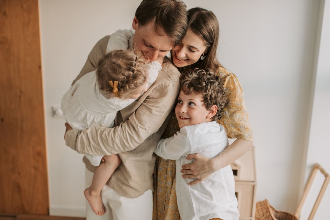 Family hugging at home, a moment of warmth and belonging