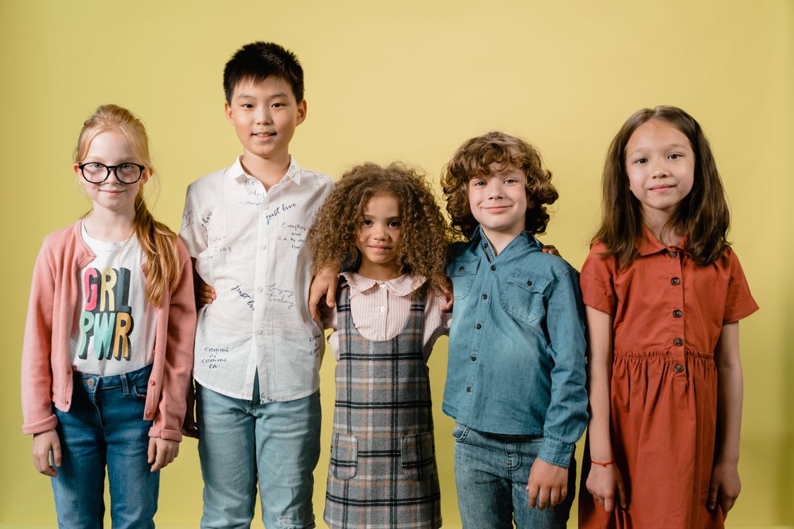 Diverse group of children smiling together