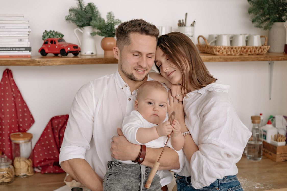 A parent and child sharing a warm moment together, the kind of photo you might upload
