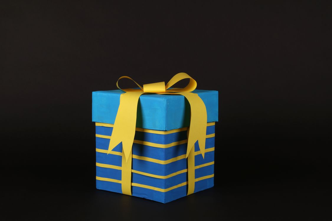 A gift box wrapped in ribbon