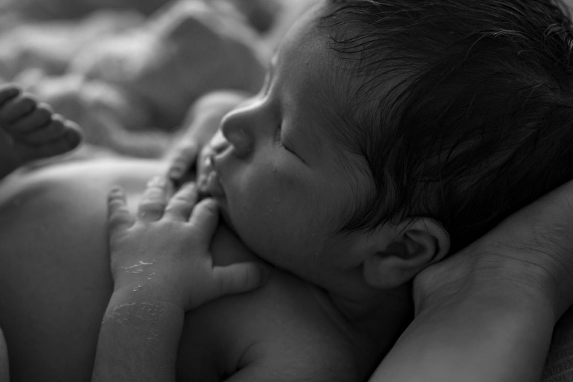 A newborn baby sleeping peacefully