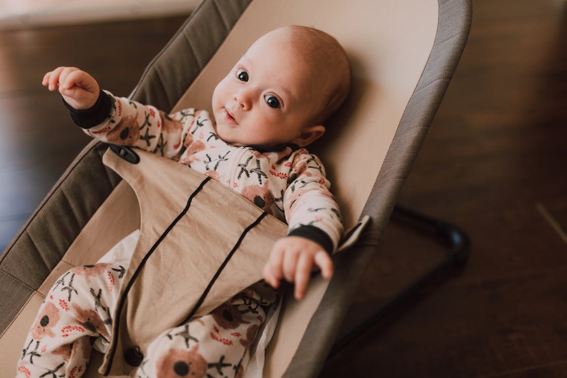 Smiling baby looking at parent