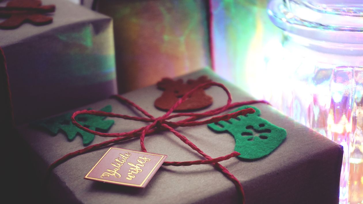 A wrapped gift box with a ribbon - symbol of a thoughtful personal gift